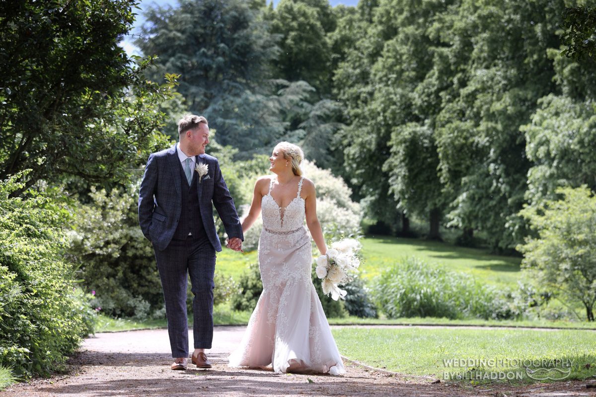 Brooksby Hall bride and groom in the garden
