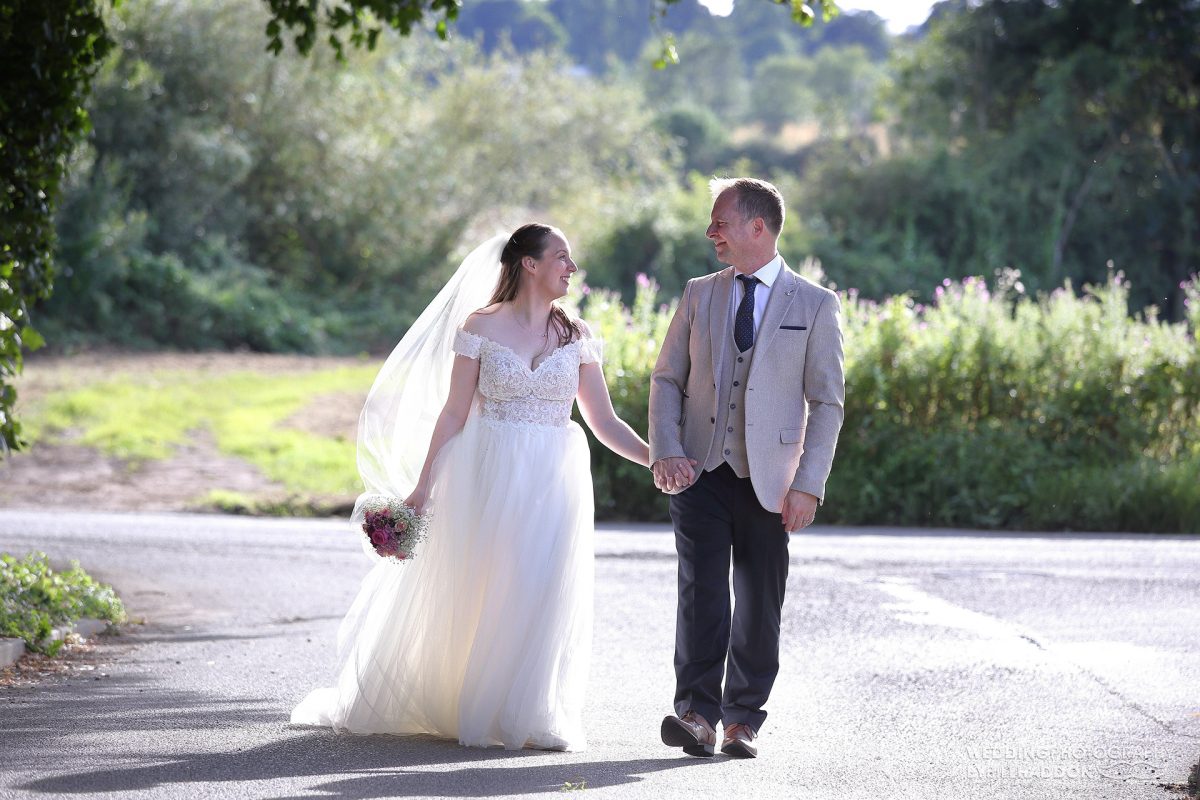 Ullesthorpe Court wedding bride and groom walking